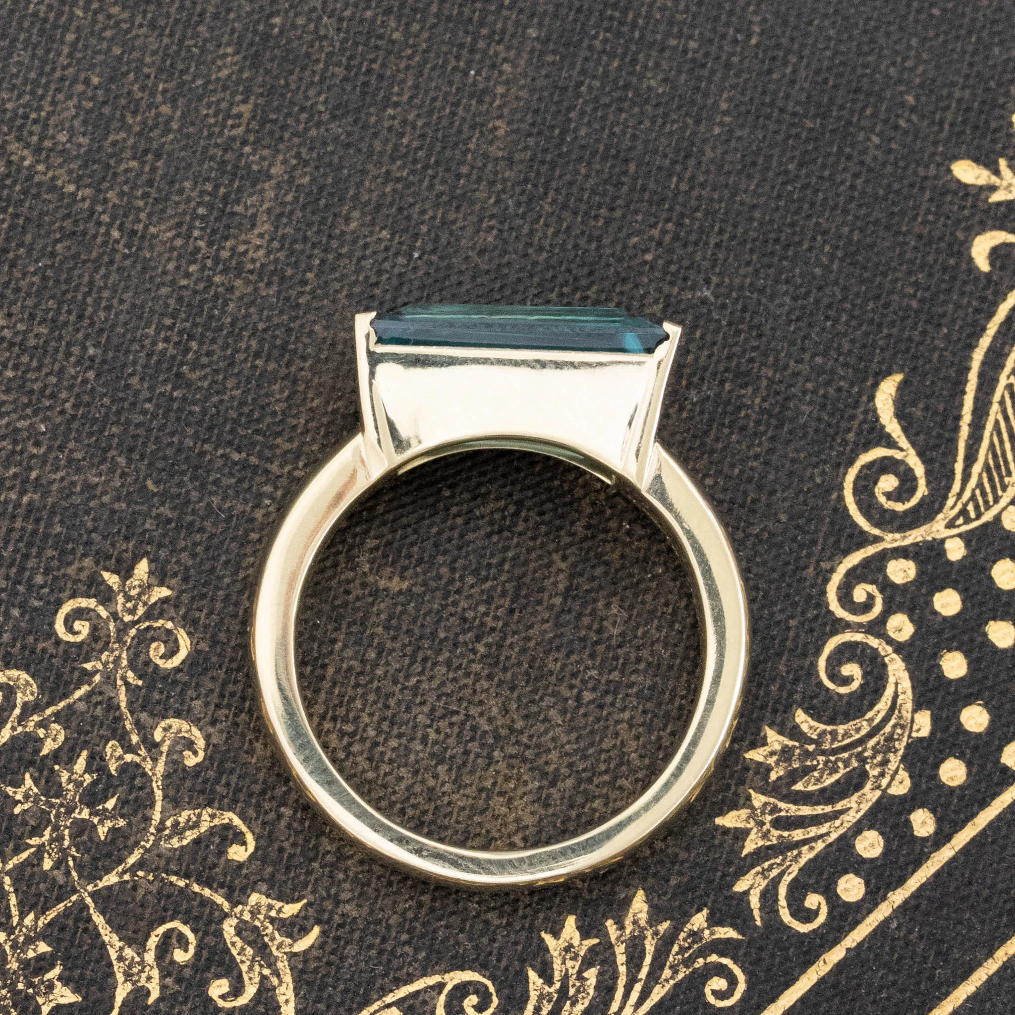 4.66ct Tapered Blue Zircon Half-Bezel Solitaire