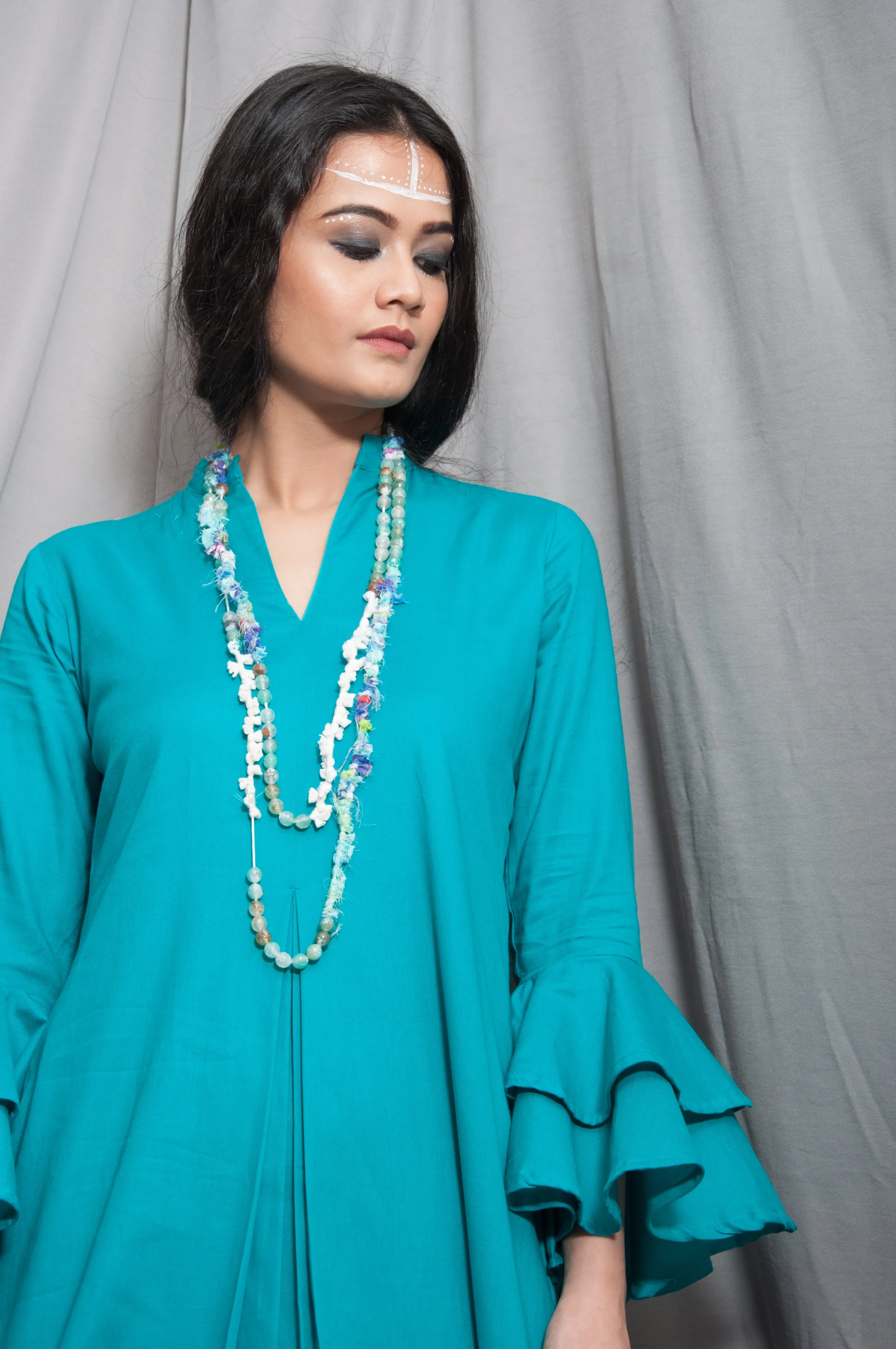 Essence- Turquoise Blue Cowl Dress With Necklace & Bell Sleeve