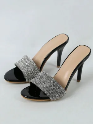 Stone studded black pencil heels
